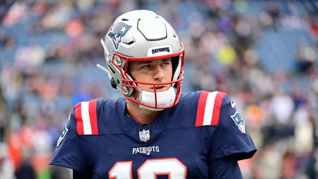 Dec 17, 2023; Foxborough, Massachusetts, USA; New England Patriots quarterback Mac Jones (10) warms up before a game against the Kansas City Chiefs at Gillette Stadium. Mandatory Credit: Eric Canha-USA TODAY Sports